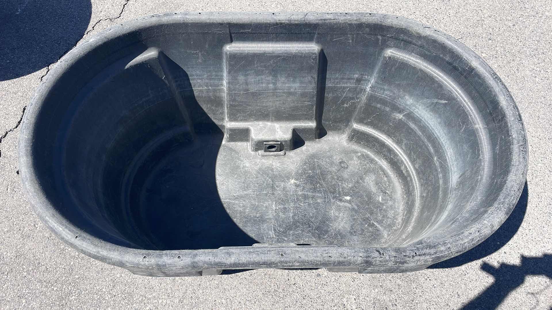 Photo 1 of RUBBERMAID 100 GAL STOCK TANK