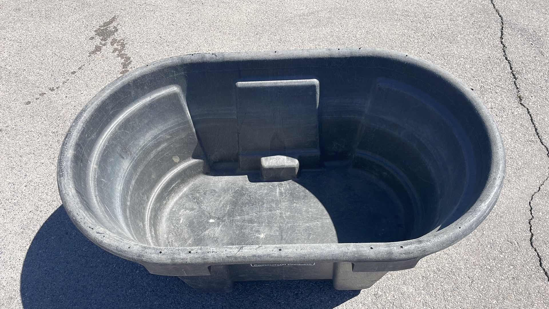 Photo 1 of RUBBERMAID 100 GAL STOCK TANK