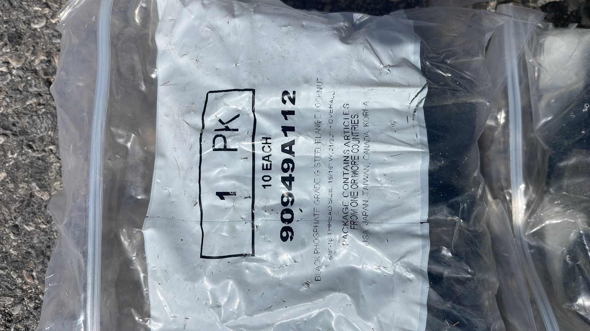 Photo 1 of BLACK - PHOSPHATE GRADE G STEEL FLANGE LOCKNUT 5/8"- 18 THREAD SIZE, 15/16" W, 21/32" H OVERALL, 6 PACKS OF 10