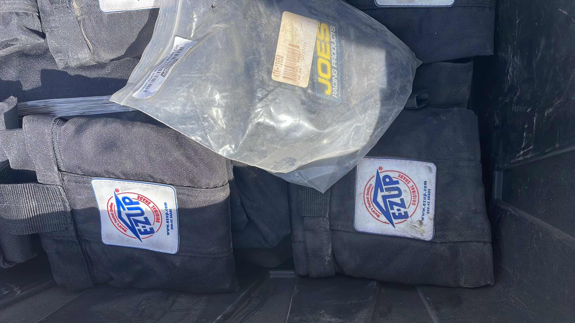 Photo 2 of EZ-UP ITEMS AND JOES RACING STEERING WHEEL PAD IN TOTE