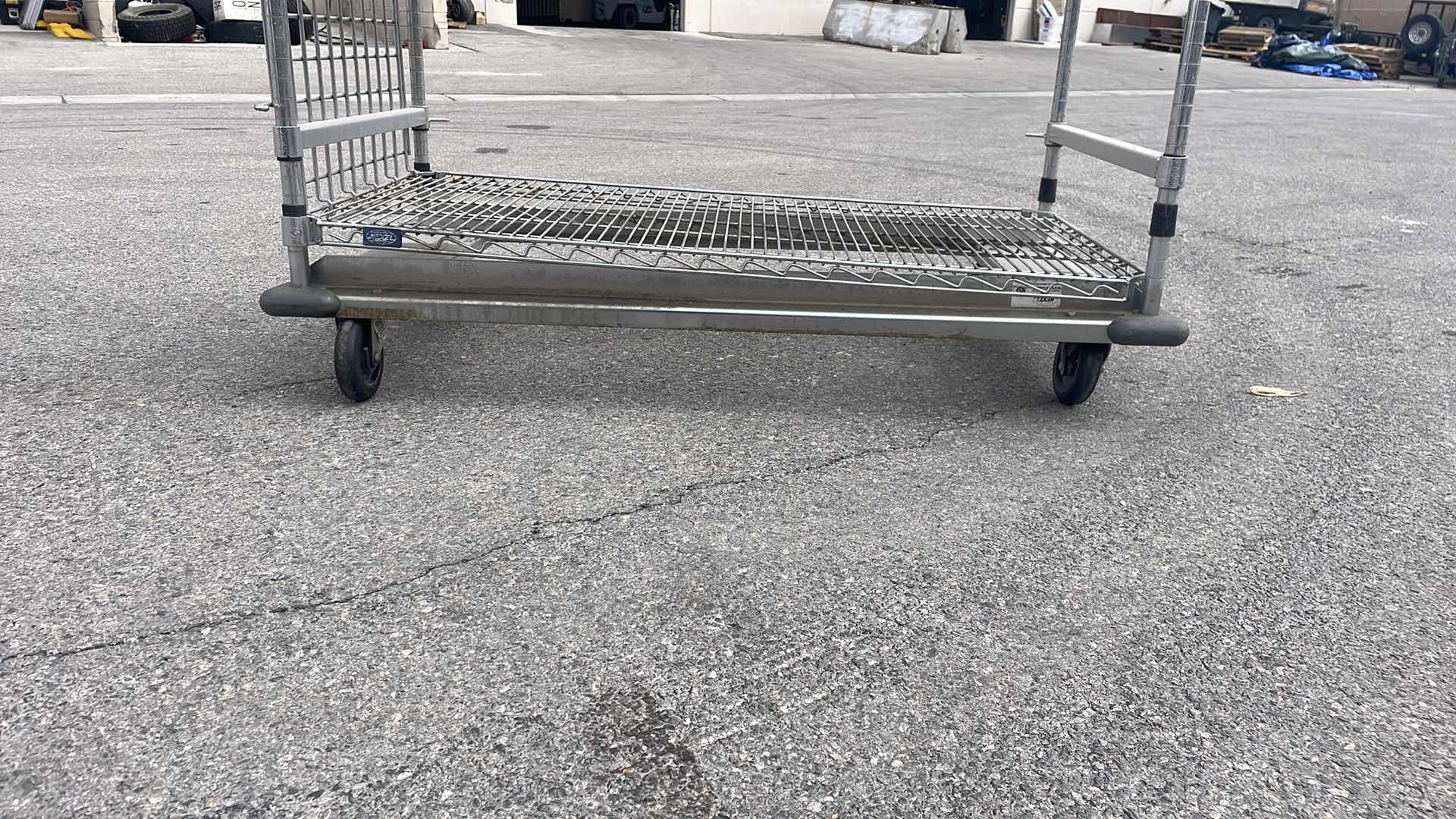 Photo 1 of NEXEL ENCLOSED WIRE EXCHANGE TRUCK W/4 SHELVES, 800 LB. CAPACITY, 48" X 24"  H69"