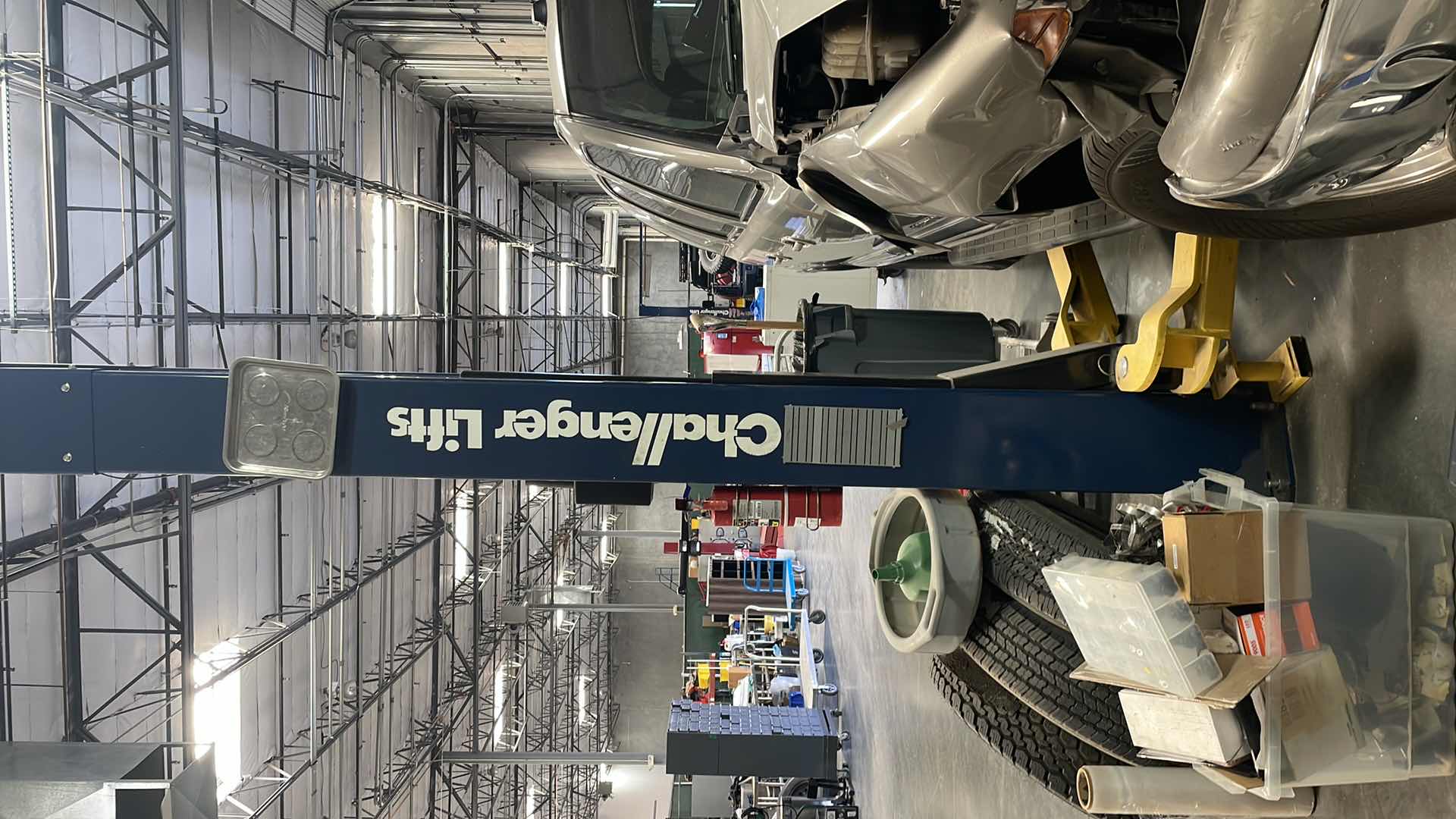 Photo 3 of CHALLENGER LIFTS VERSYMMETRIC MODEL CL 10 SERIAL# 070300000030185
SINGLE PHASE 20AMP 230V 10000LBS CAPACITY