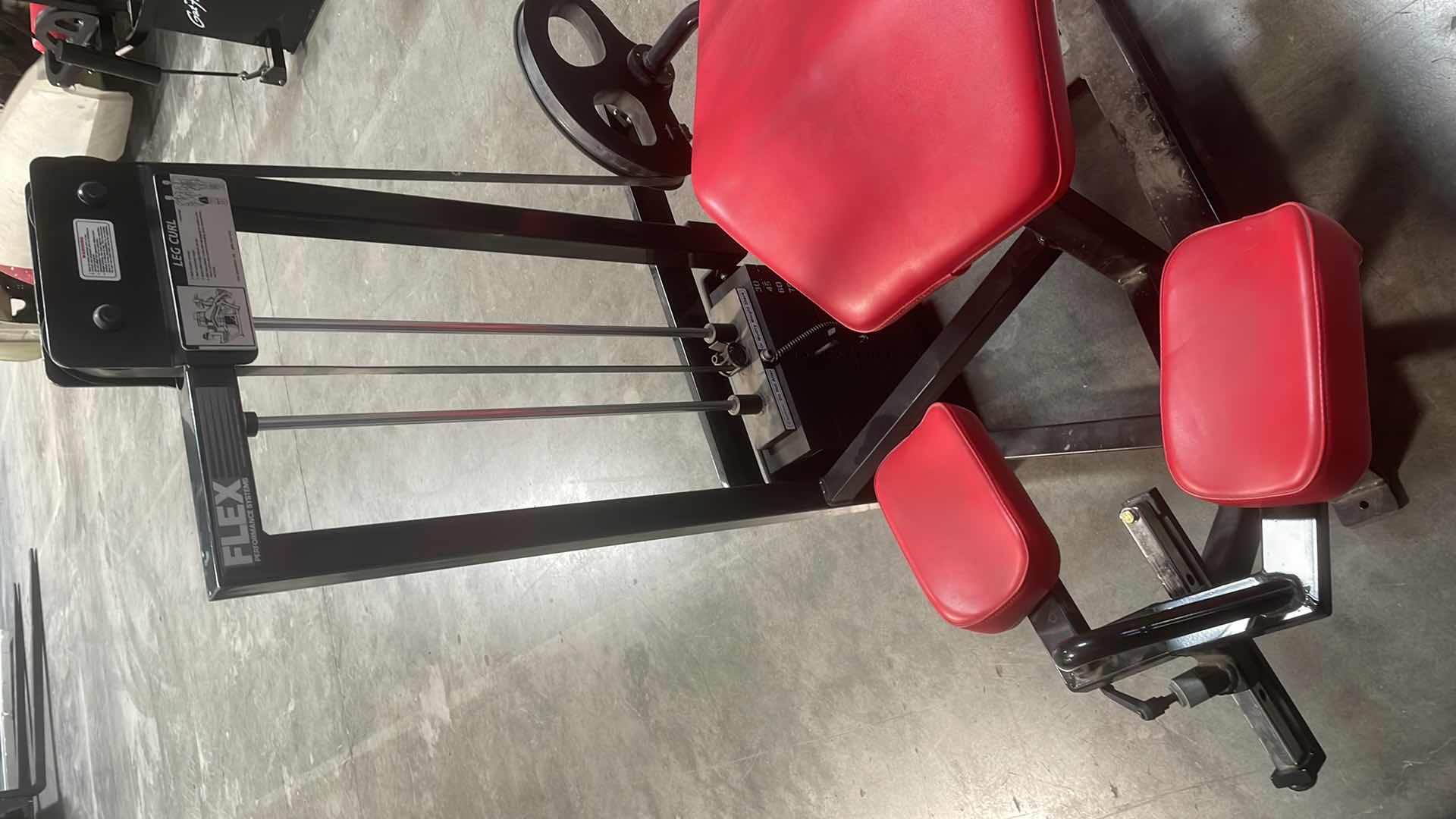 Photo 1 of FLEX PERFORMANCE SYSTEMS LEG CURL MACHINE NEED NEW FABRIC ON ONE PIECE