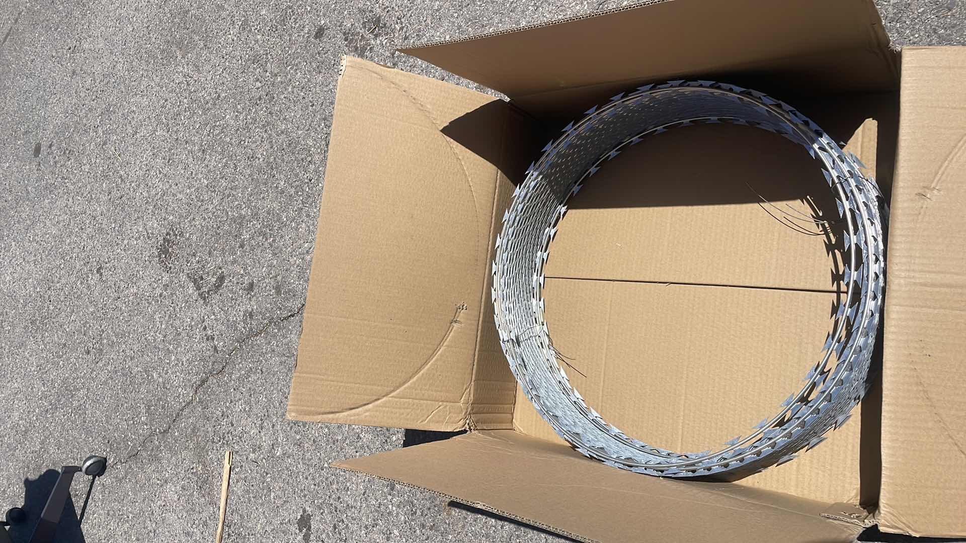 Photo 1 of NEW COIL OF RAZOR WIRE UNKNOWN FOOTAGE