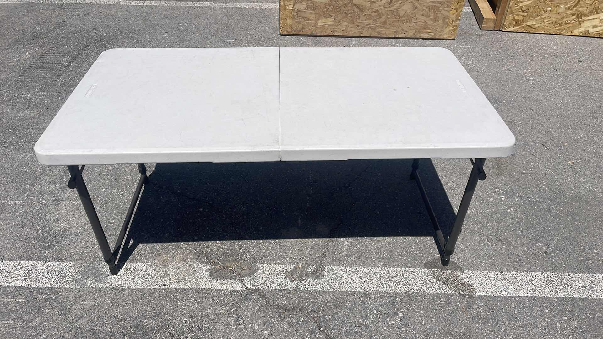 Photo 1 of LIFETIME FOLDING ADJUSTABLE HEIGHT TABLE 48” x 24