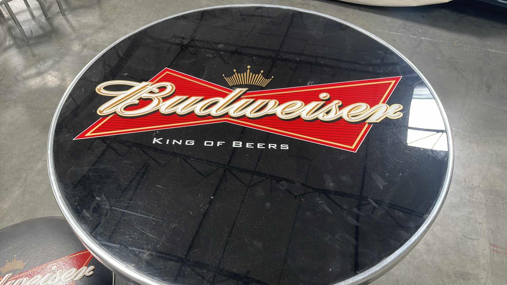 Photo 1 of BUDWEISER BAR TABLE 27” AND 3 BAR STOOLS