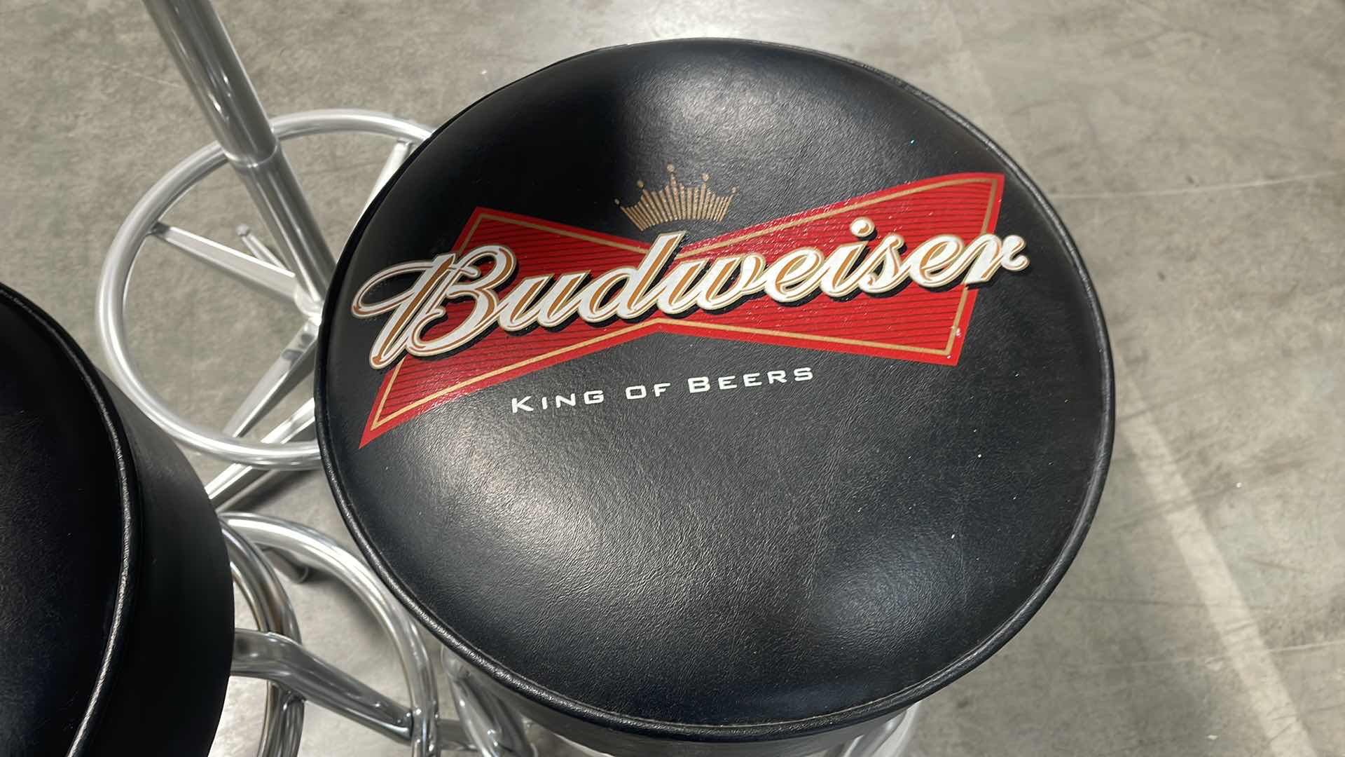 Photo 1 of BUDWEISER BAR TABLE 27” AND 3 BAR STOOLS