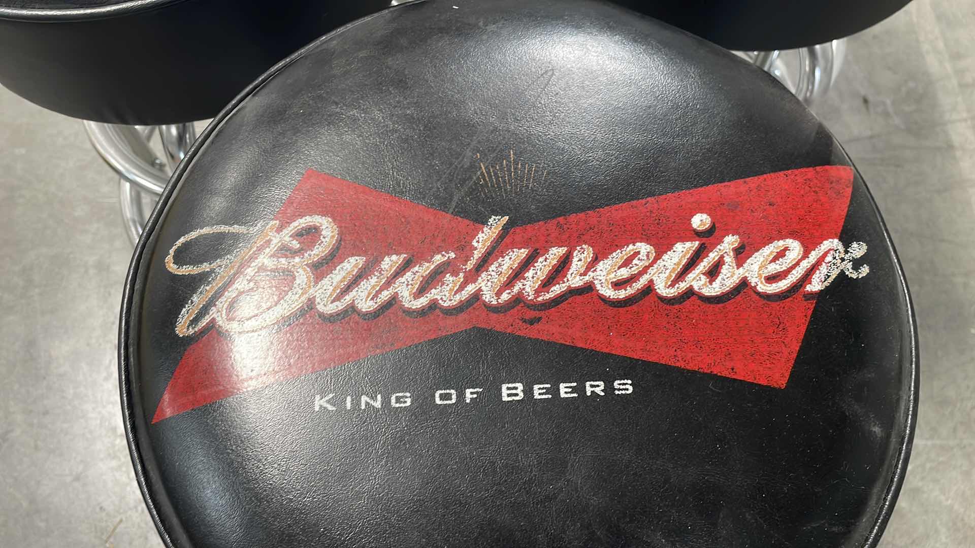 Photo 1 of BUDWEISER BAR TABLE 27” AND 3 BAR STOOLS