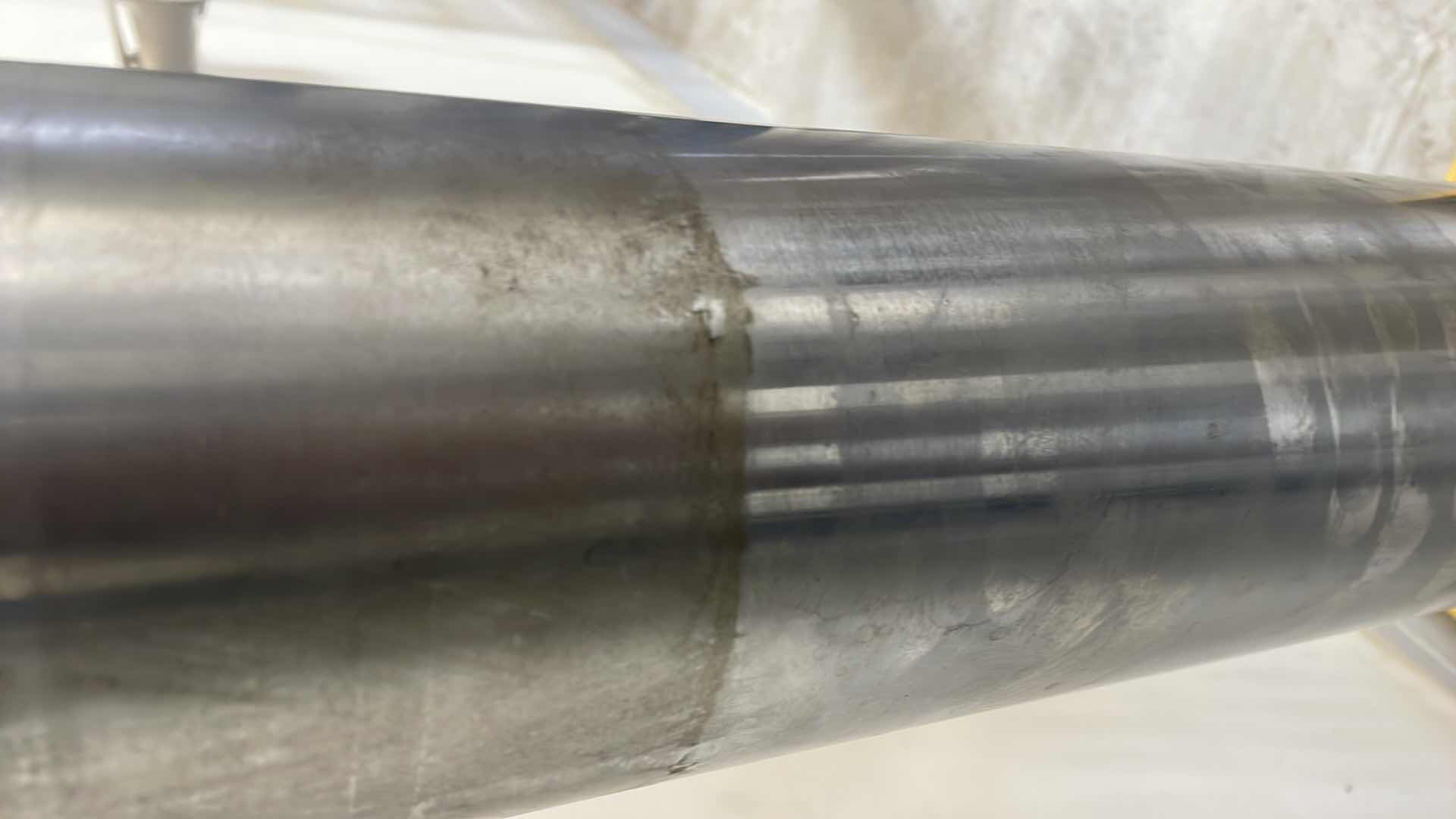 Photo 1 of CHUNK OF STAINLESS STEEL EXTREMELY HEAVY TOP IS 5” DIAMETER X 36-1/2” BASE IS ABOUT 14” DIAMETER X 6”