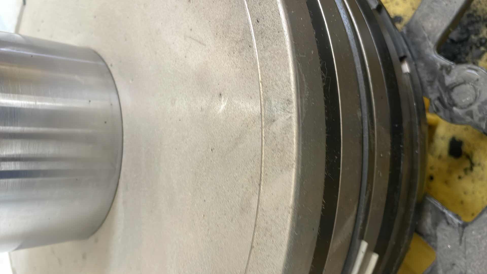 Photo 1 of CHUNK OF STAINLESS STEEL EXTREMELY HEAVY TOP IS 5” DIAMETER X 36-1/2” BASE IS ABOUT 14” DIAMETER X 6”