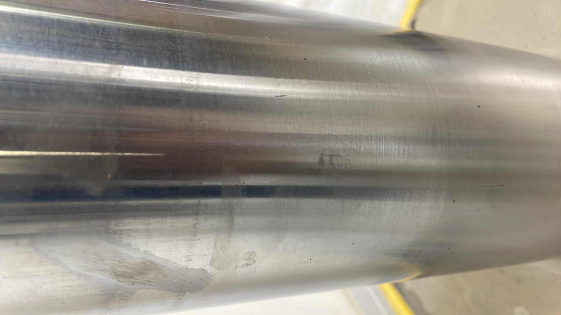 Photo 1 of CHUNK OF STAINLESS STEEL EXTREMELY HEAVY TOP IS 5” DIAMETER X 36-1/2” BASE IS ABOUT 14” DIAMETER X 6”