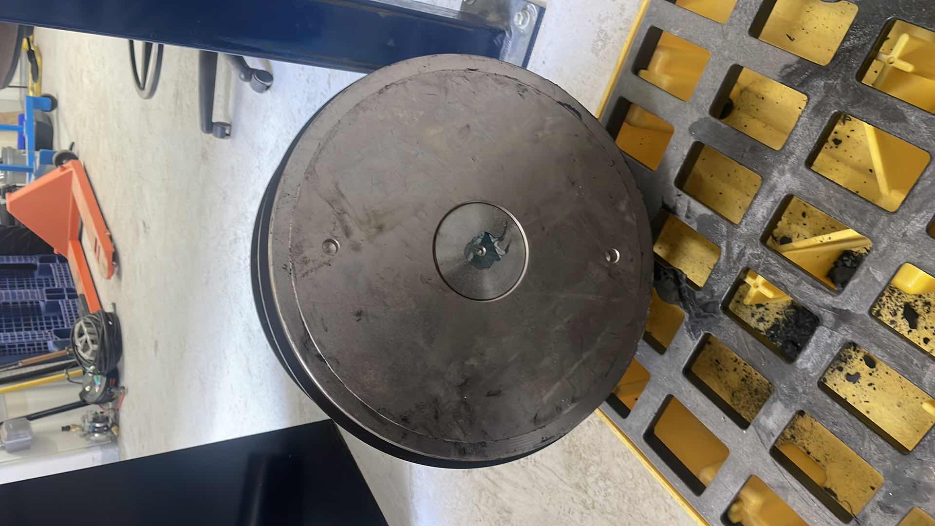 Photo 1 of CHUNK OF STAINLESS STEEL EXTREMELY HEAVY TOP IS 5” DIAMETER X 36-1/2” BASE IS ABOUT 14” DIAMETER X 6”