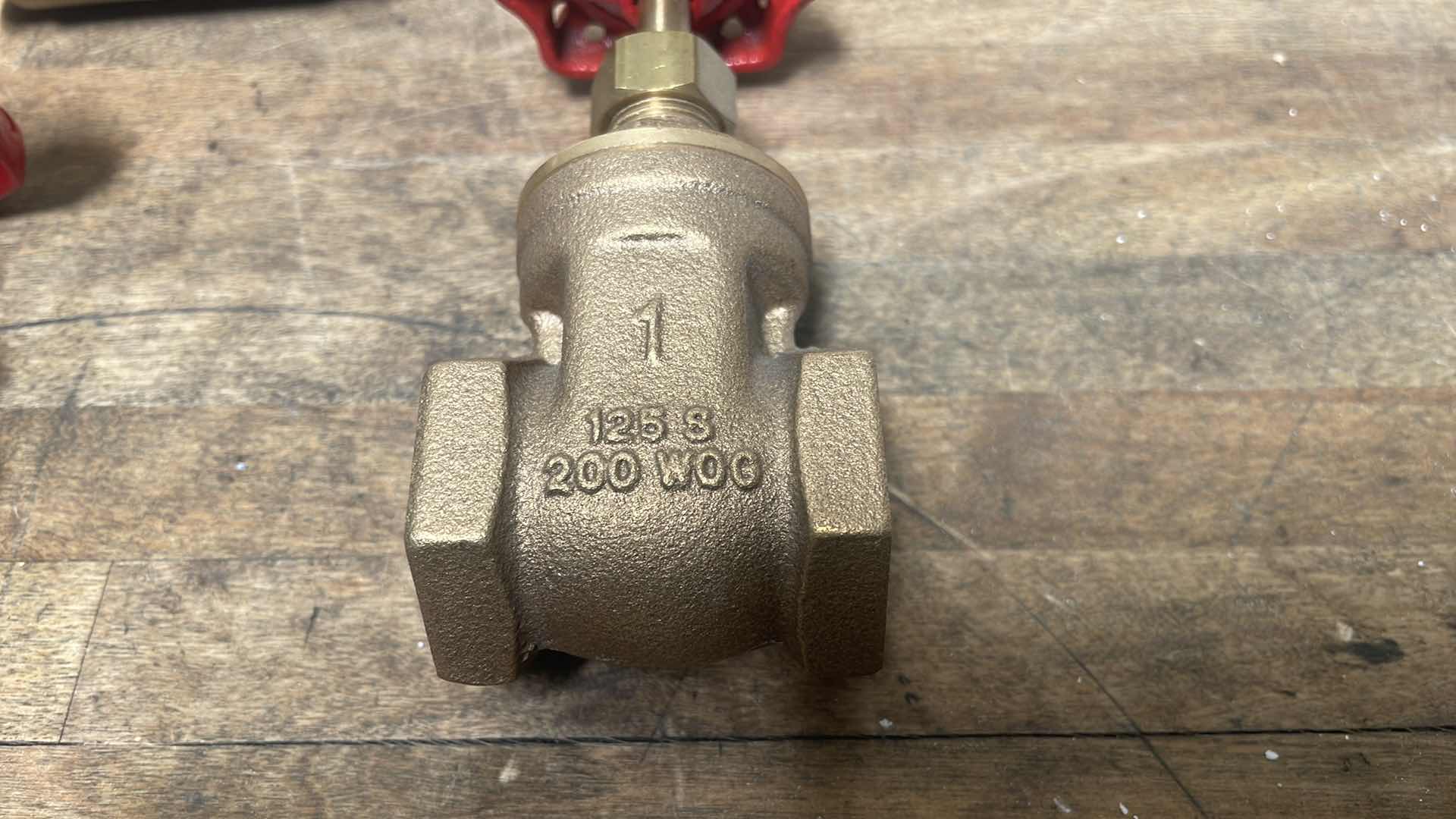 Photo 1 of 1” STAINLESS STEEL TEES, MIDLAND, CHECK VALVE, 1" FEMALE NPT X 1" FEMALE NPT, BRASS, 3/4” & 1” GATE VALVES, MISC BRASS FITTINGS