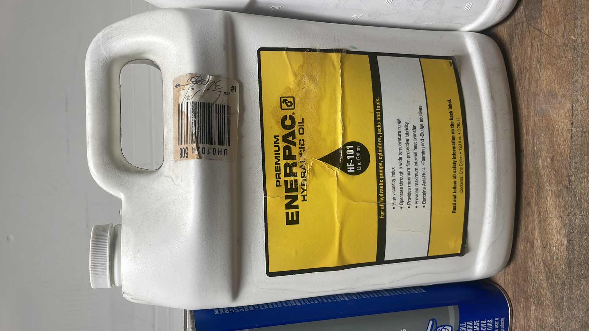 Photo 4 of MISC FLUIDS IN A GRAY PLASTIC CONTAINER SUSPENSION FLUID ABOUT 1/3 FULL