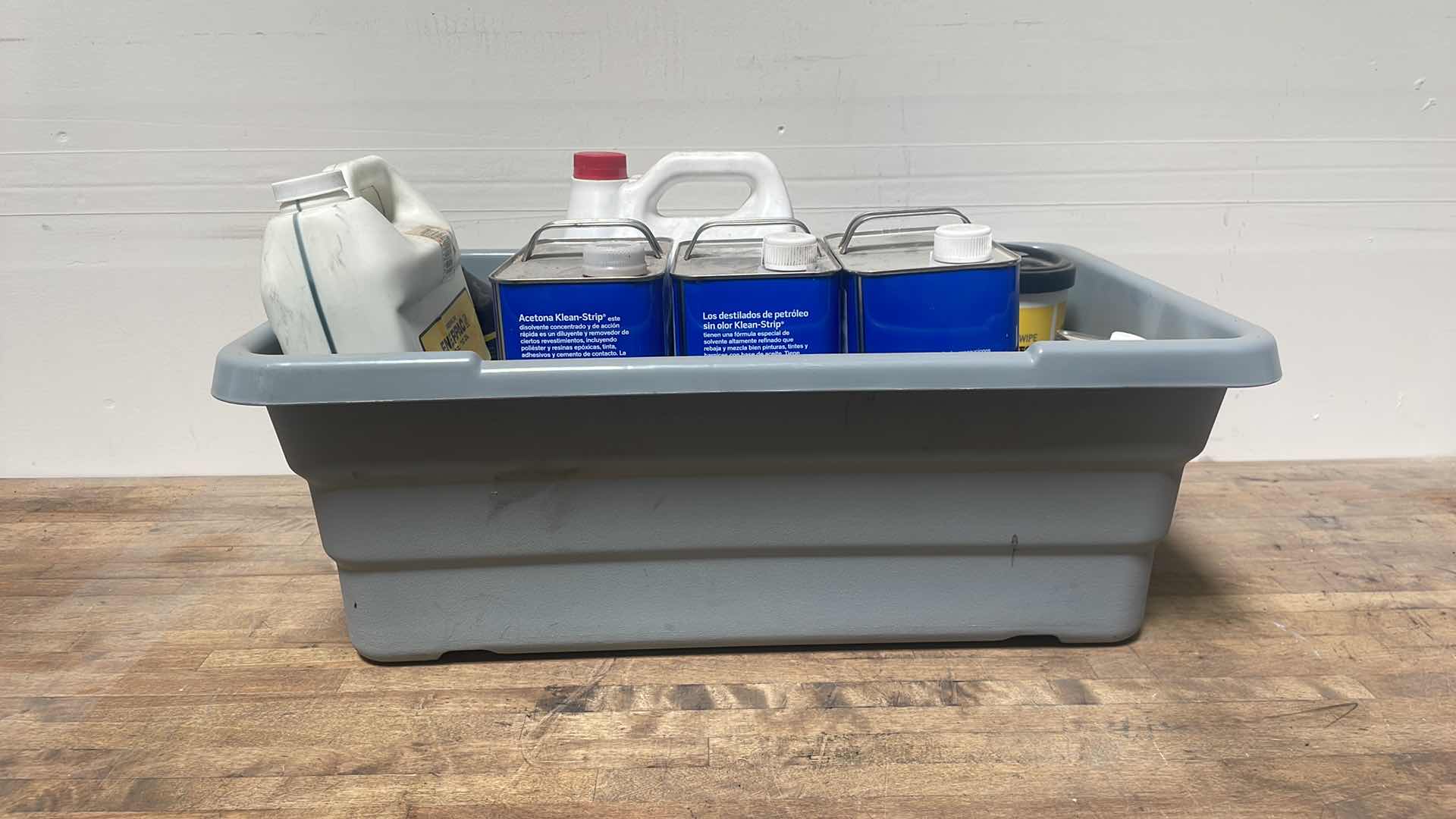 Photo 9 of MISC FLUIDS IN A GRAY PLASTIC CONTAINER SUSPENSION FLUID ABOUT 1/3 FULL