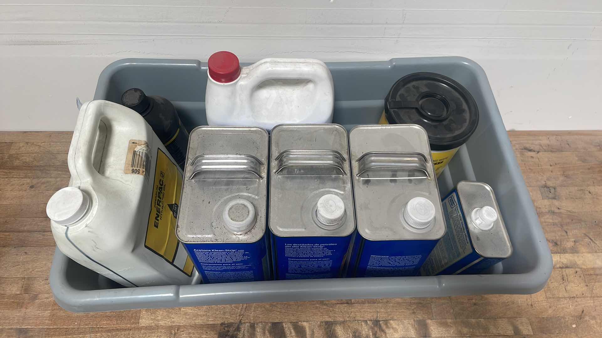 Photo 10 of MISC FLUIDS IN A GRAY PLASTIC CONTAINER SUSPENSION FLUID ABOUT 1/3 FULL