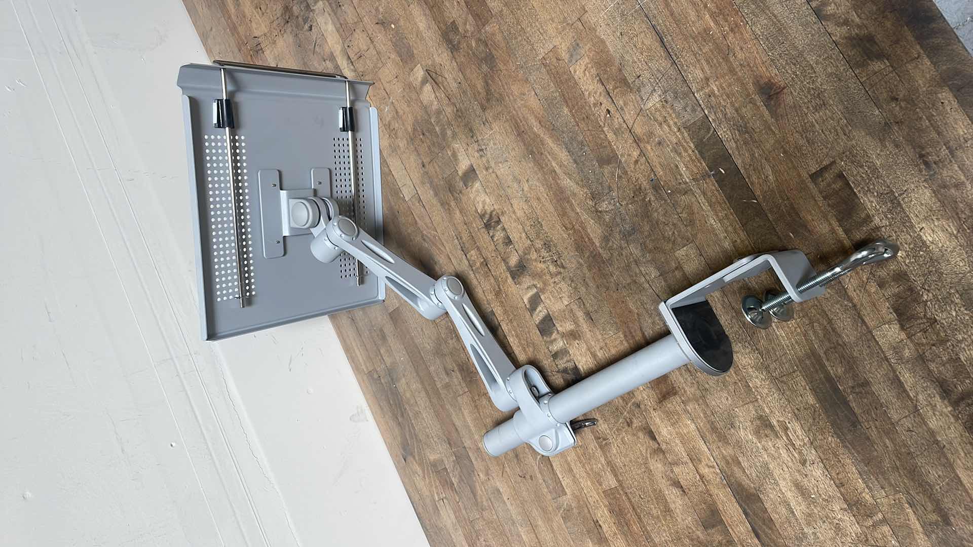 Photo 1 of FULL-MOTION DESKTOP CLAMP FOR LAPTOP