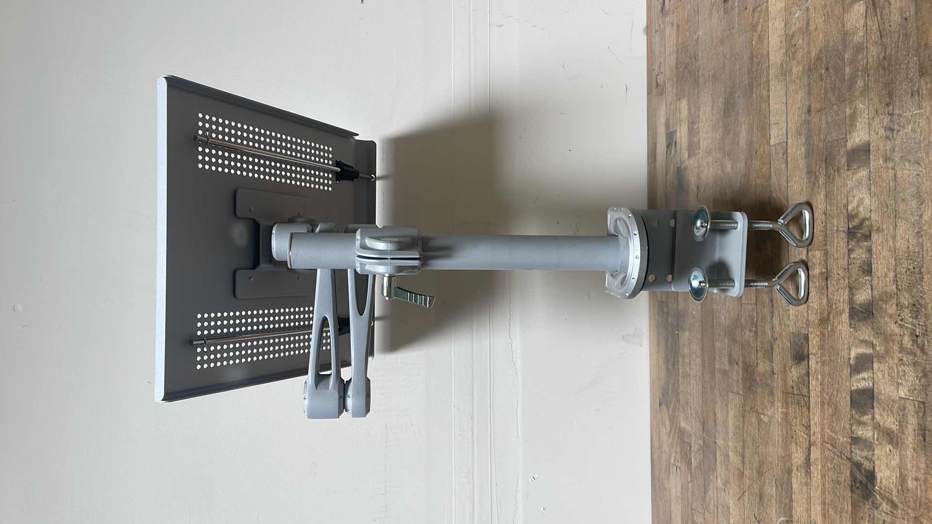 Photo 1 of FULL-MOTION DESKTOP CLAMP FOR LAPTOP