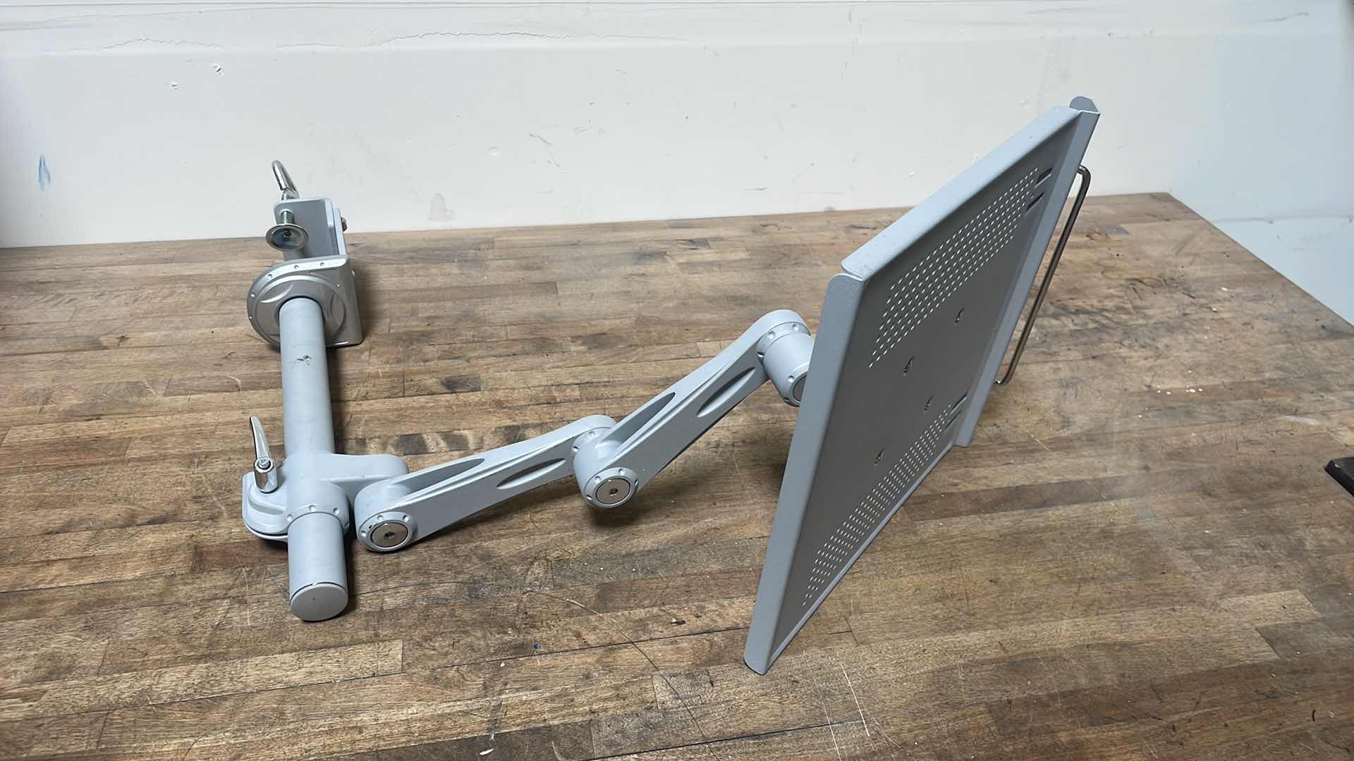 Photo 1 of FULL-MOTION DESKTOP CLAMP FOR LAPTOP