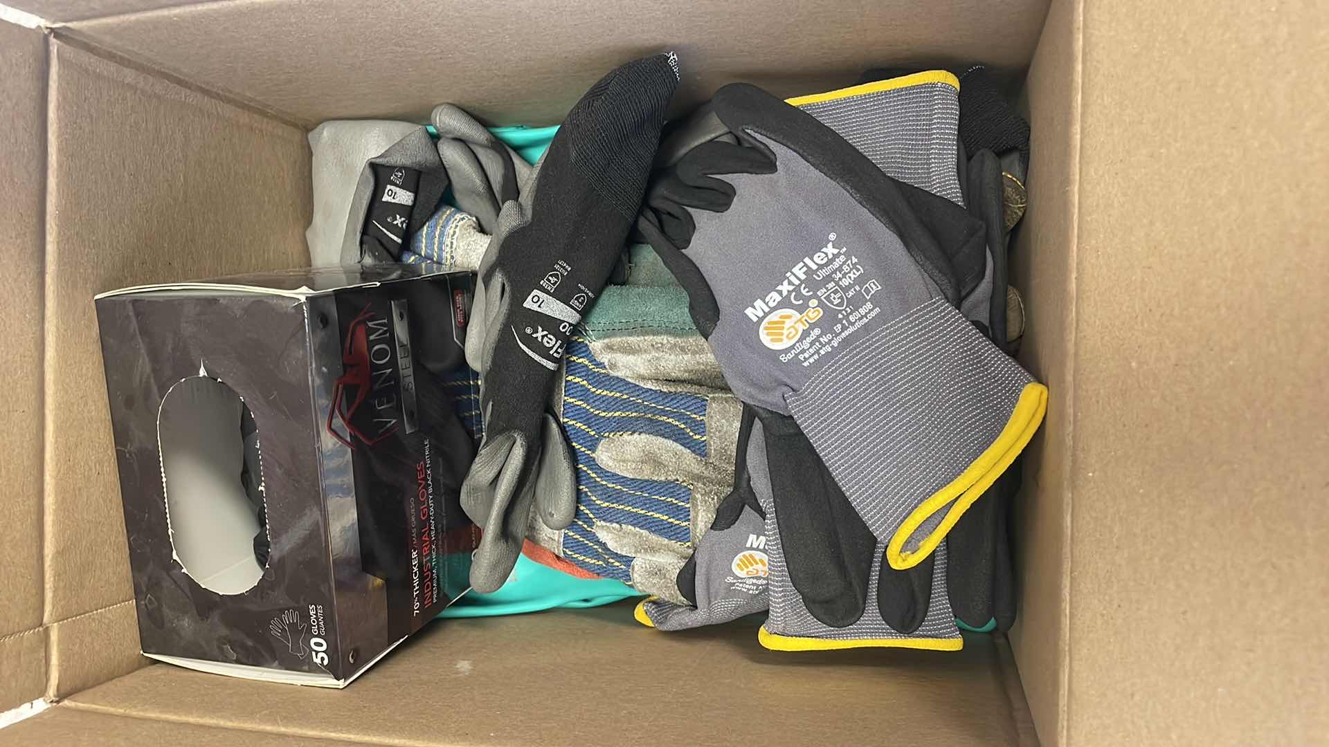 Photo 1 of BOX OF MISC GLOVES