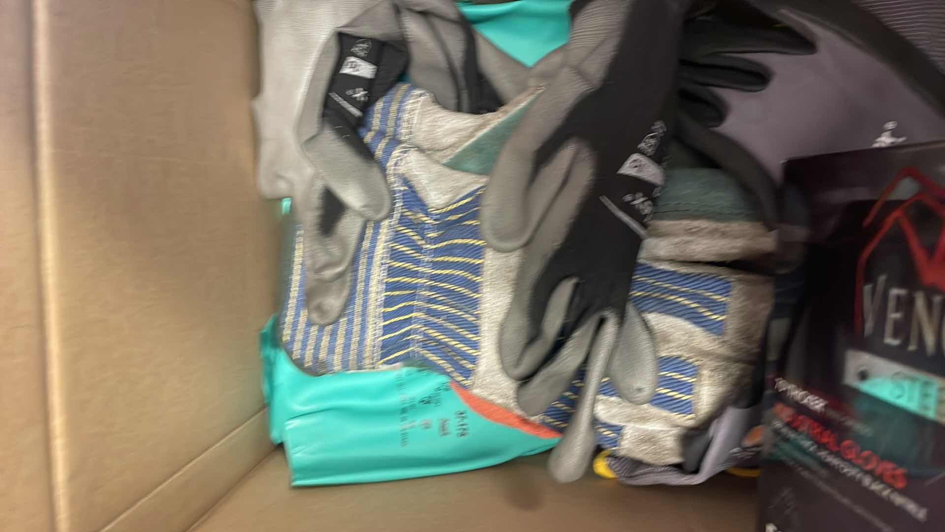 Photo 2 of BOX OF MISC GLOVES