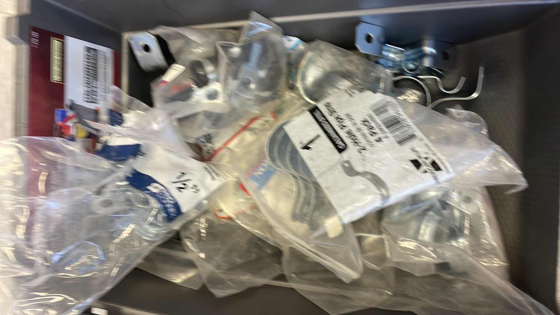 Photo 1 of VARIETY OF BOLTS, PIPE STRAPS IN HUSKY STACKABLE CLICK BINS