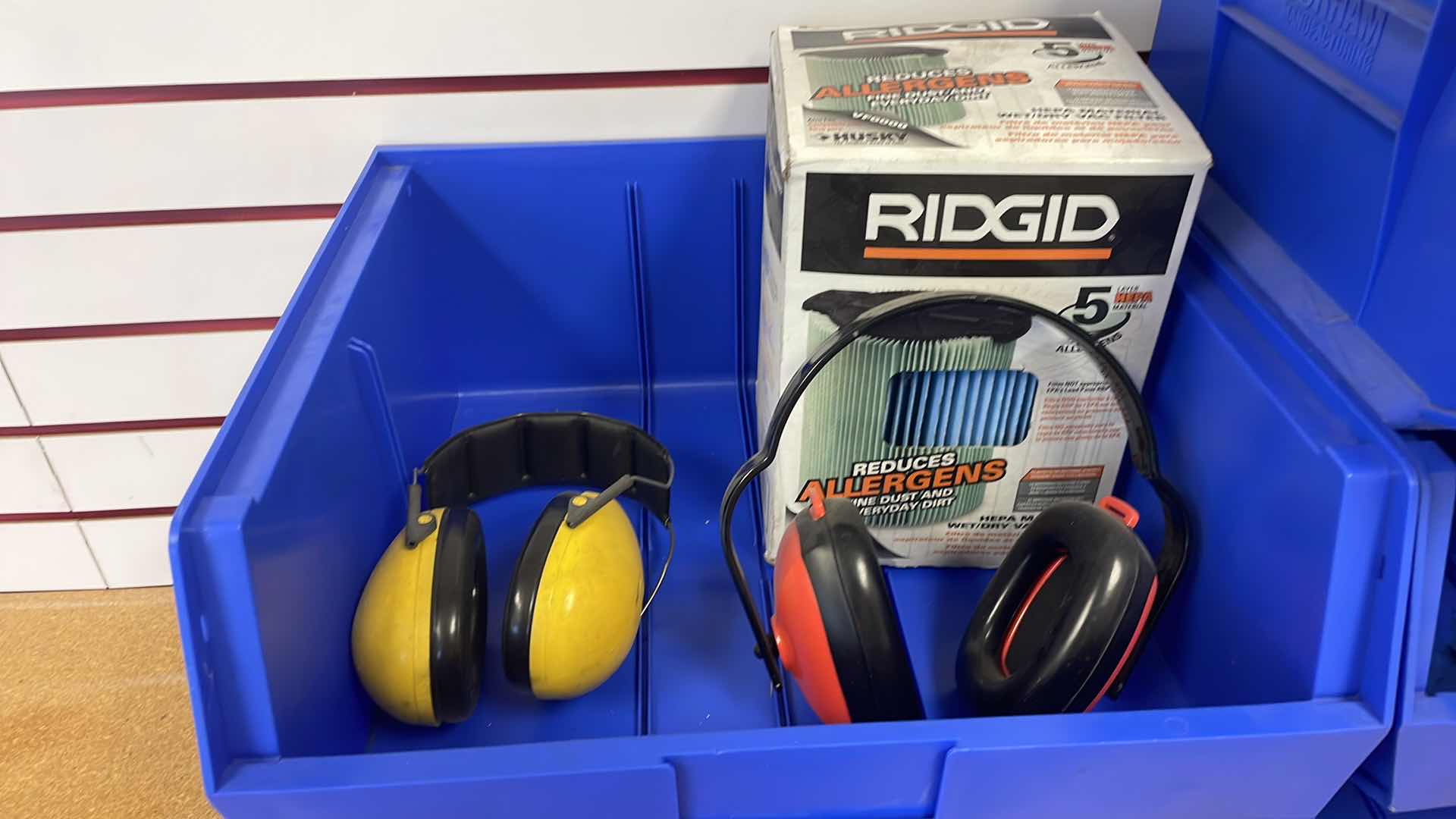 Photo 1 of DURHAM 16-1/2” x 14-1/2” x 7” STACKABLE BINS WITH ASSORTMENT OF HOSES HEARING PROTECTION AND RIDGID WET/DRY VACUUM FILTER