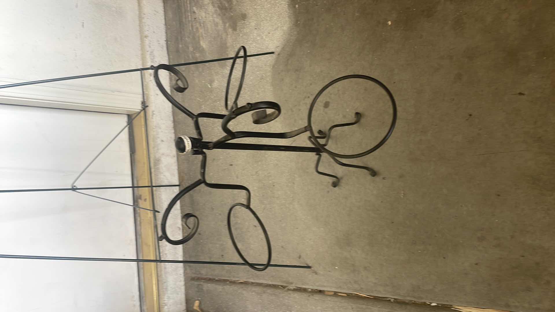 Photo 1 of 54” METAL EASEL, METAL FLOWER POT STAND