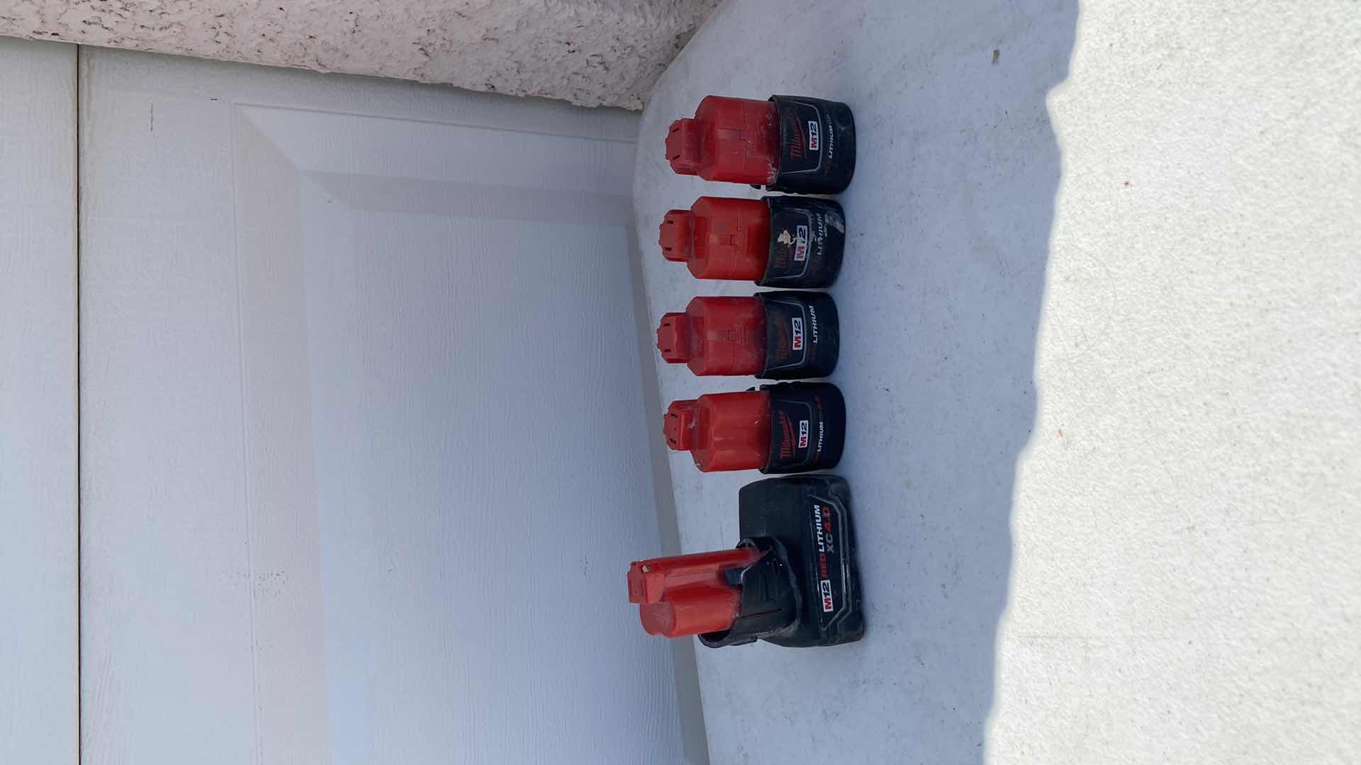 Photo 1 of MILWAULKEE 23GA PIN NAIL GUN 
BATTERY AND CHARGER INCLUDING 
TESTED WORKING