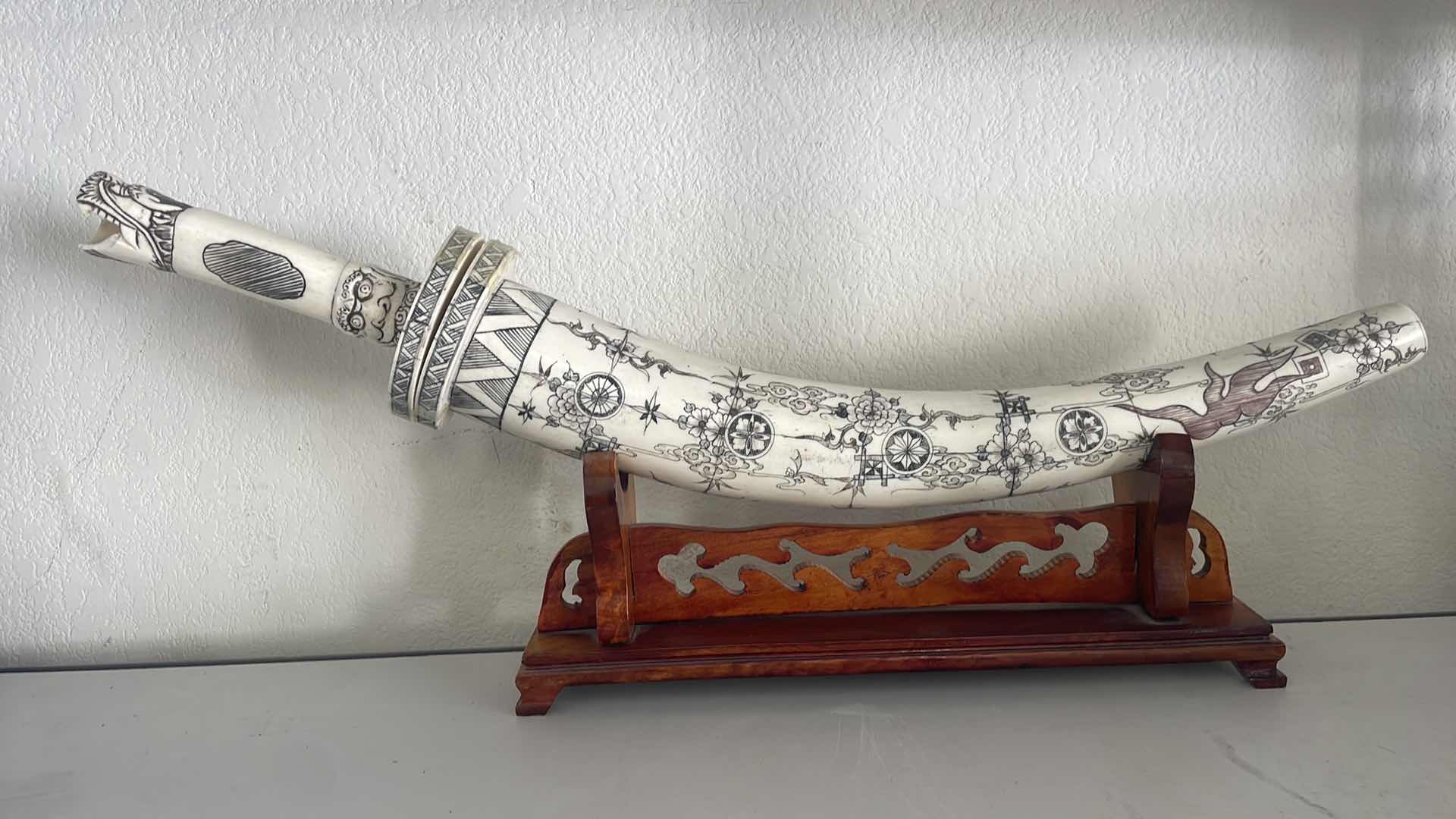 Photo 1 of CARVED BONE TUSK DRAGON SWORD 28” ON WOOD STAND