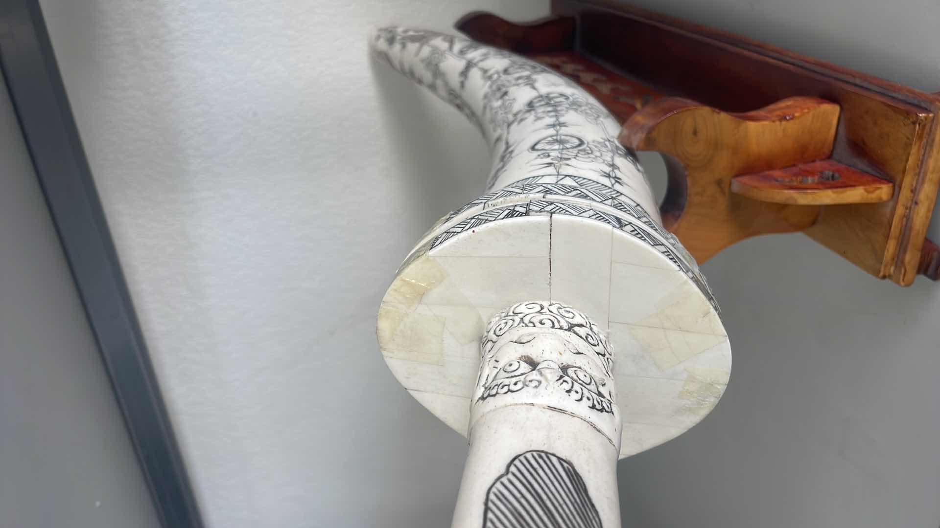 Photo 1 of CARVED BONE TUSK DRAGON SWORD 28” ON WOOD STAND