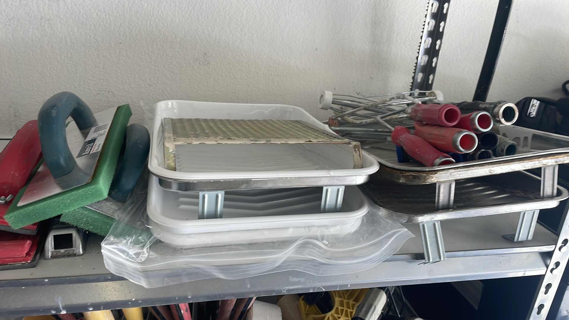 Photo 1 of CONTENTS OF SHELF, PAINT TRAYS PAINT ROLLERS SANDPAPER FOAM FLOATS