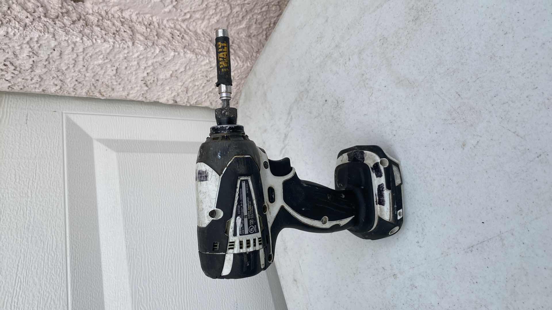 Photo 1 of MAKITA 18V IMPACT AND HAMMER DRILL AND BATTERY CHARGER NO BATTERY 
TESTED WORKING