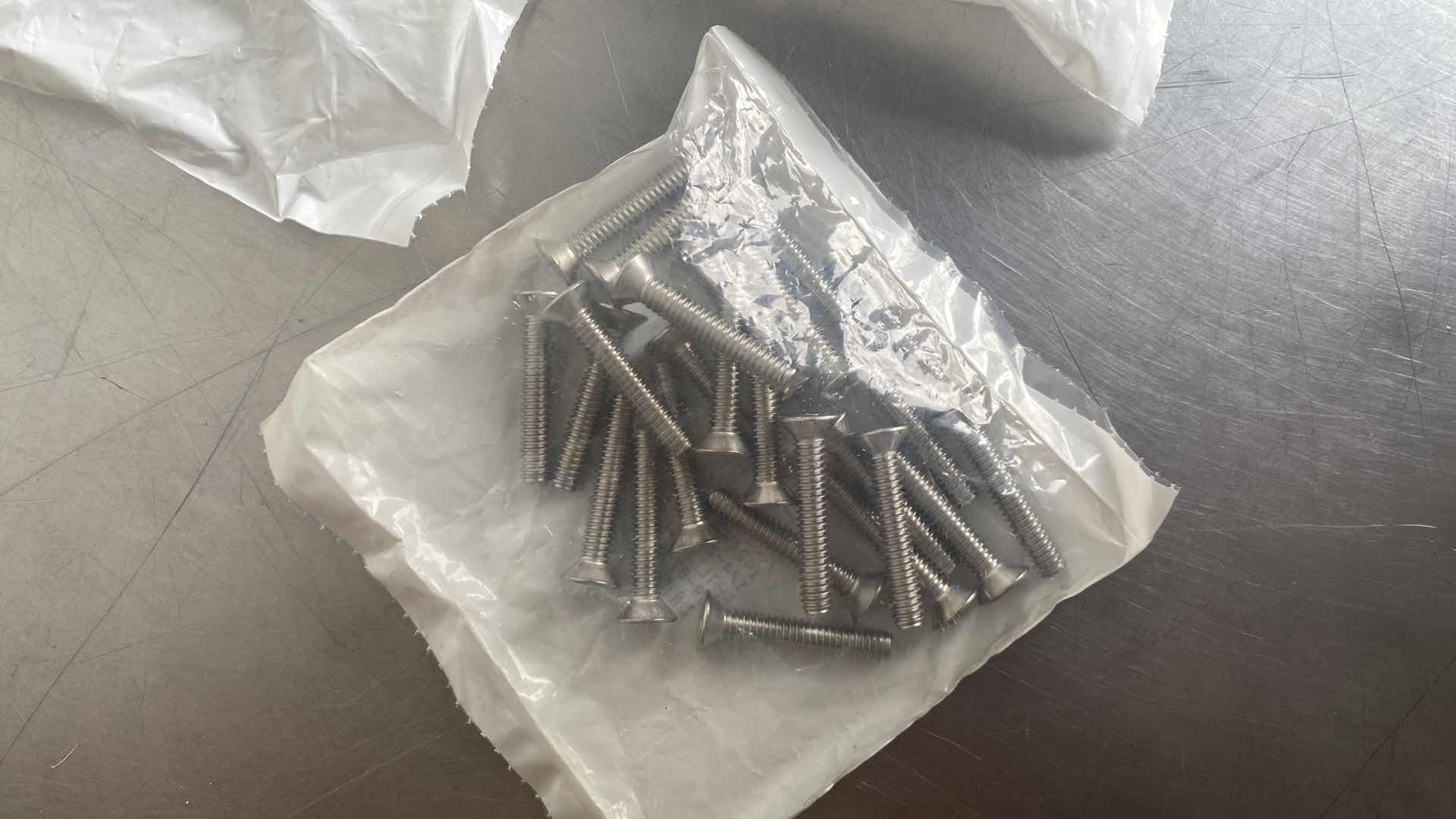 Photo 1 of 1/4-20 X 1-1/2 STAINLESS STEEL PHILLIPS MACHINE SCREWS (225) & 1/4-20 NUTS (100)