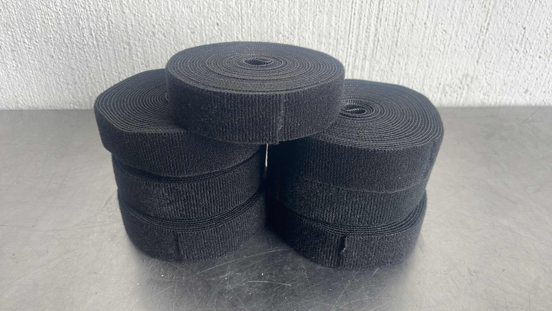 Photo 1 of HOOK AND LOOP TAPE 7 ROLLS UNKNOWN LENGTH PER ROLL