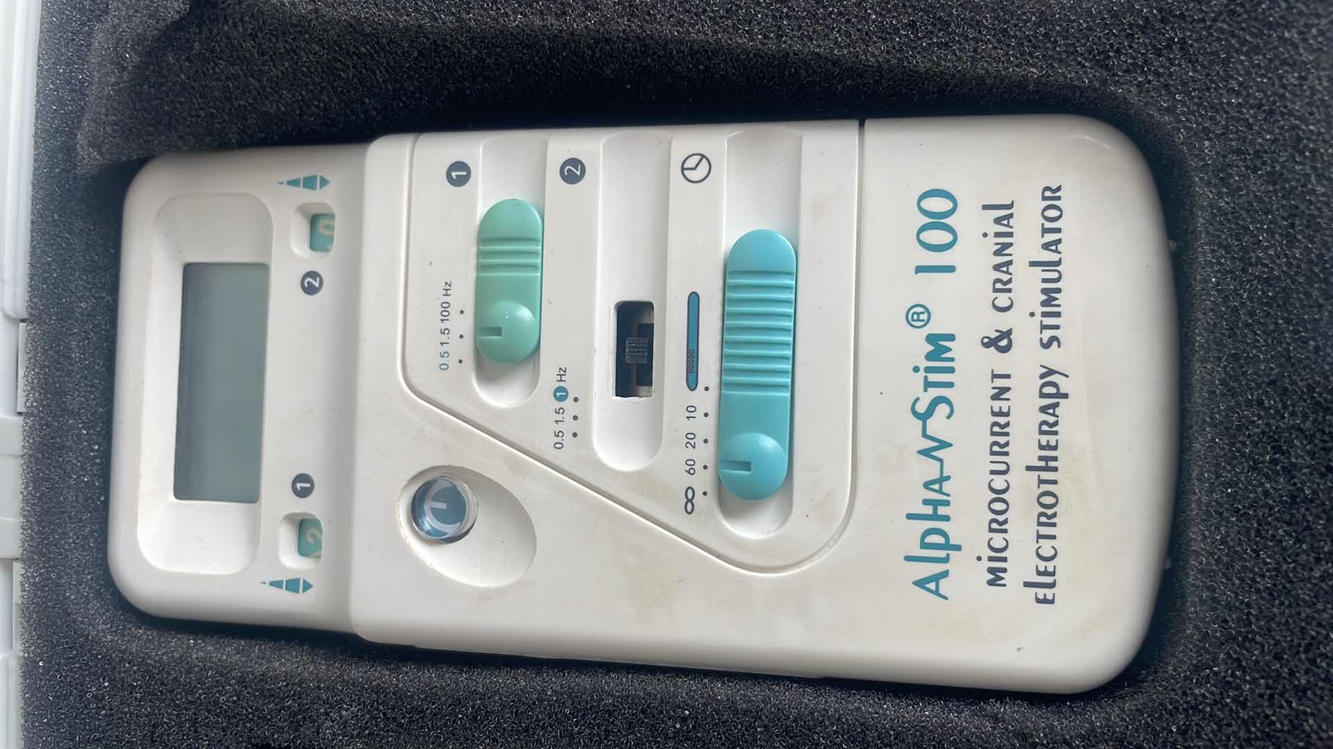 Photo 1 of ALPHA-STIM 100 MICROCURRENT AND CRANIAL ELECTROTHERAPY STIMULATOR KIT