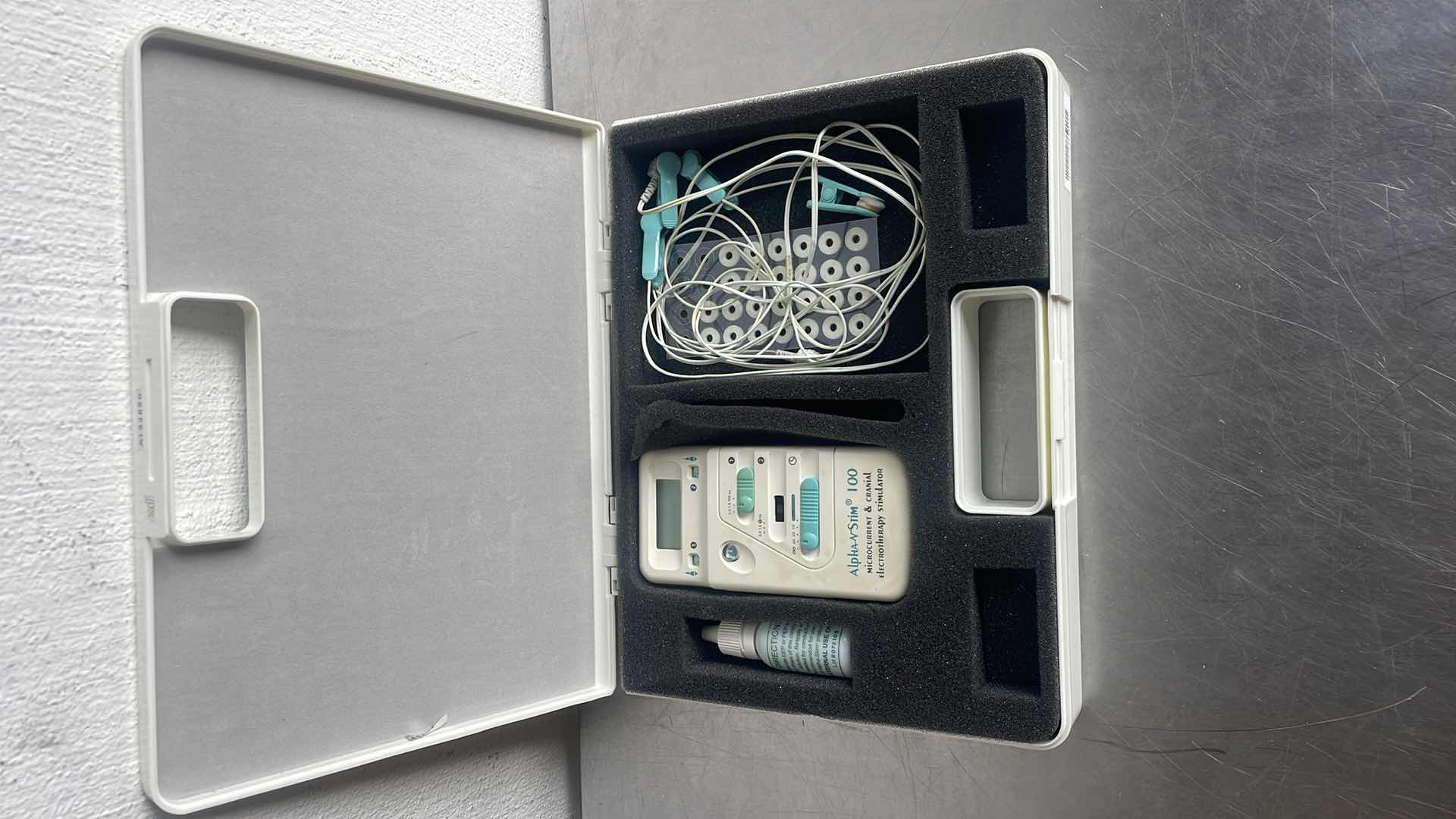 Photo 1 of ALPHA-STIM 100 MICROCURRENT AND CRANIAL ELECTROTHERAPY STIMULATOR KIT