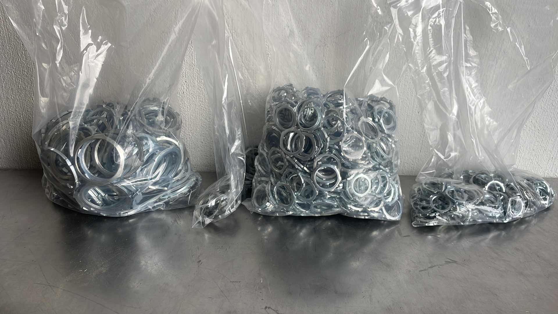 Photo 1 of 976 PCS. ASSORTED CONDUIT LOCK NUTS 3/4", 1", 1-1/4" & 2"
