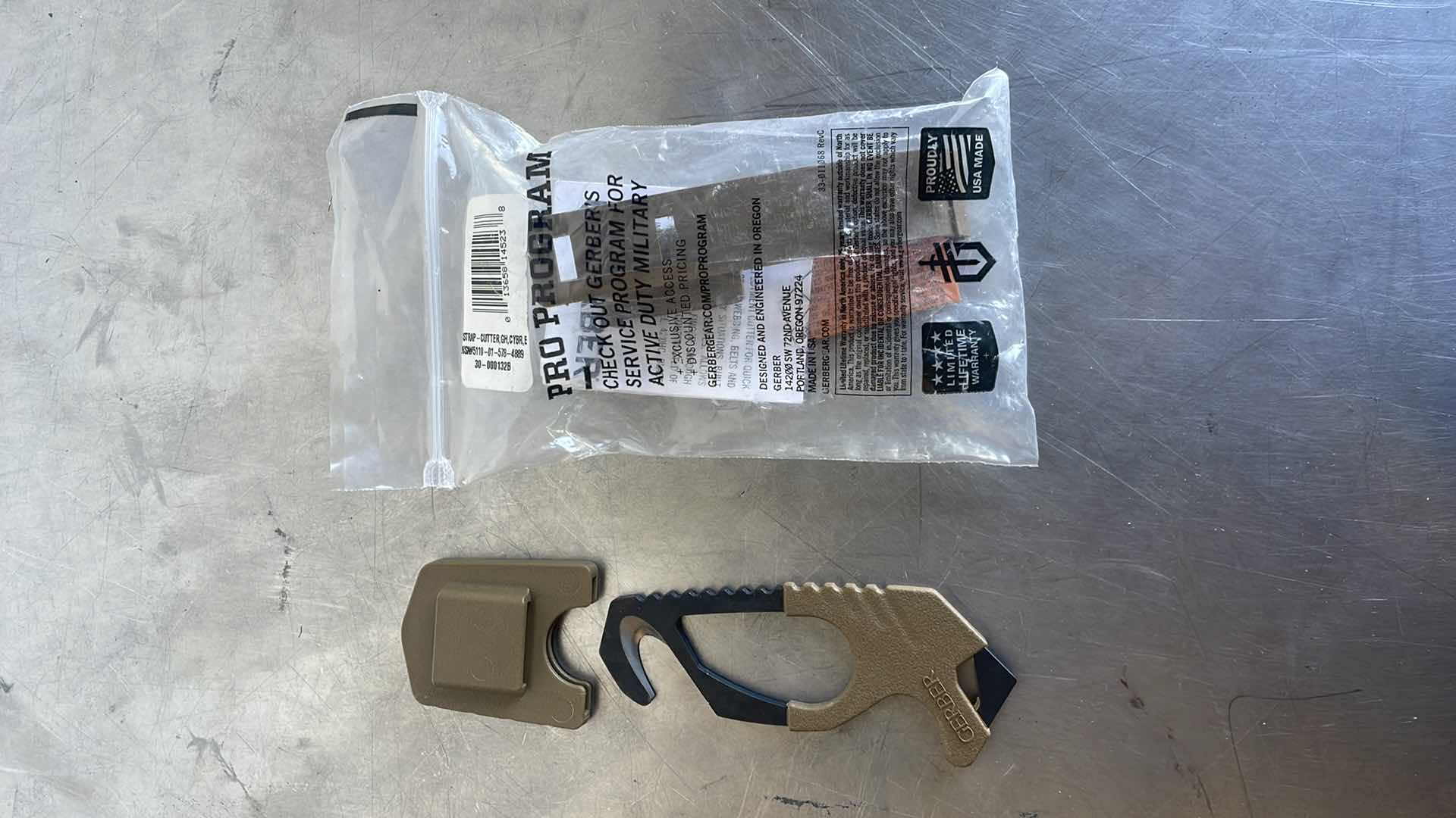 Photo 1 of GERBER STRAP CUTTER