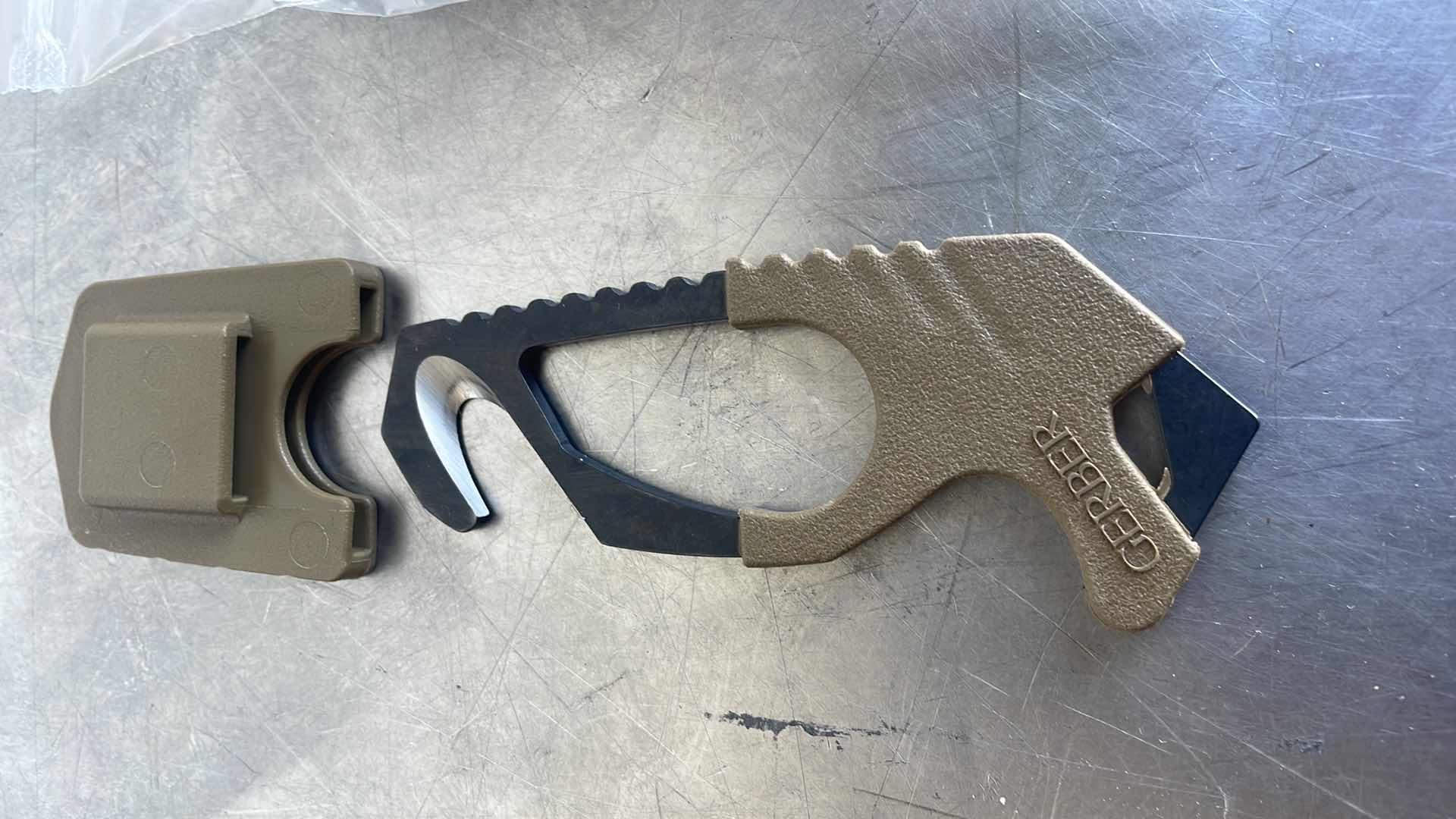 Photo 1 of GERBER STRAP CUTTER