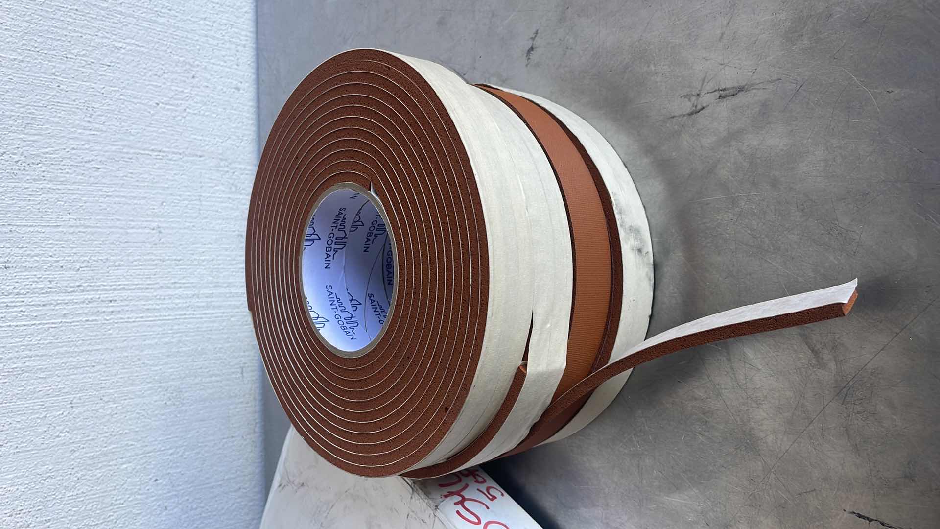 Photo 1 of SAINT-GOBAIN 100S 1" X 5YDS STRIP-N-STICK SILICONE SPONGE TAPE NEW/UNUSED SURPLUS 4 ROLLS