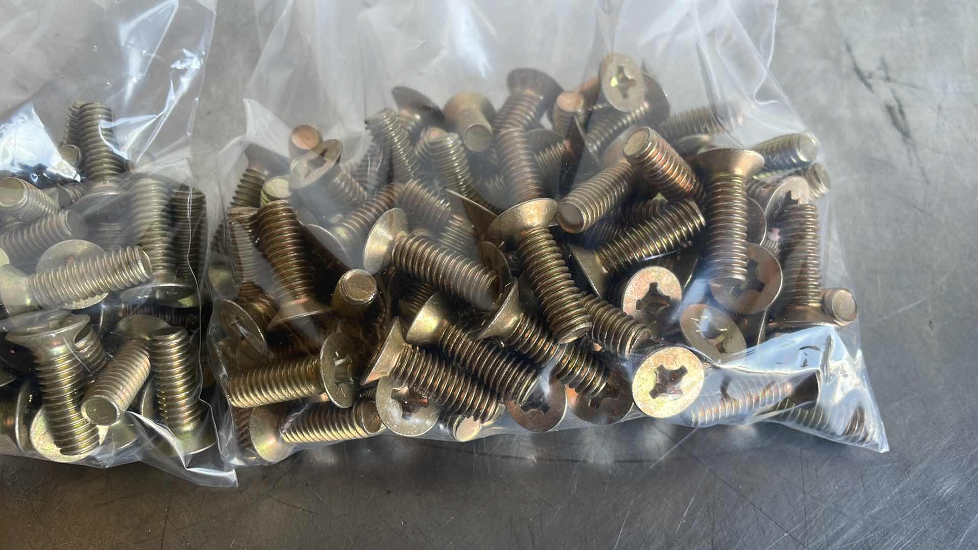 Photo 1 of 5/16”-18x1” PHILLIPS HEAD SCREWS 200 PCS