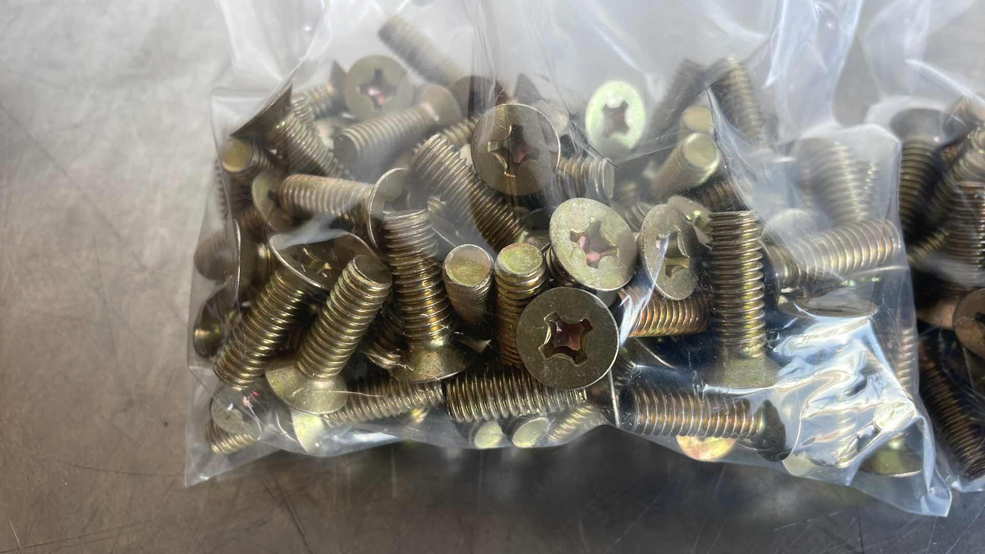 Photo 1 of 5/16”-18x1” PHILLIPS HEAD SCREWS 200 PCS