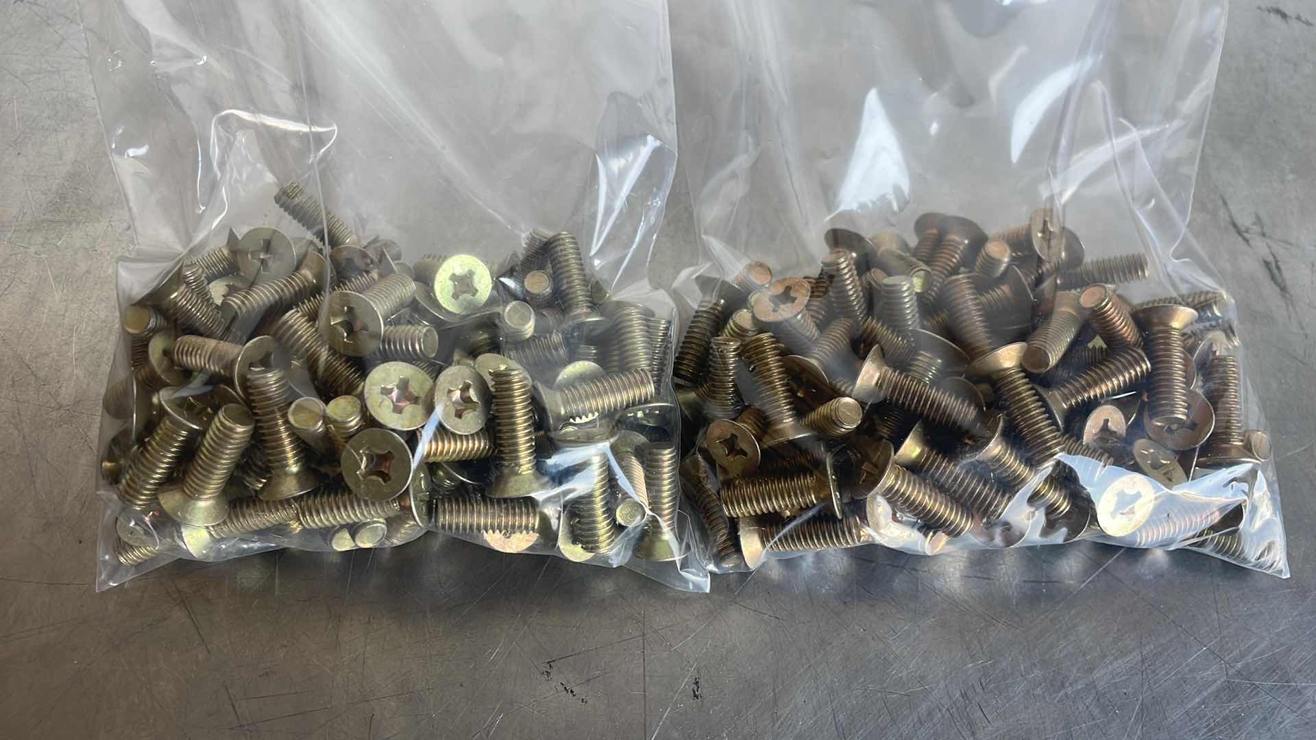 Photo 1 of 5/16”-18x1” PHILLIPS HEAD SCREWS 200 PCS