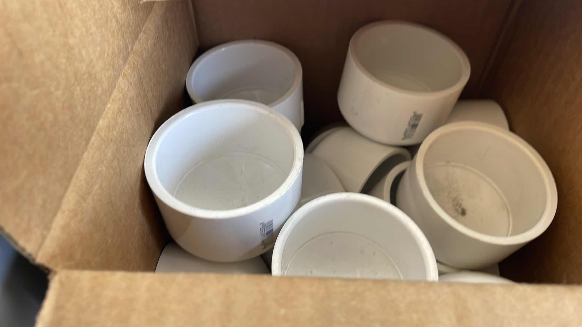 Photo 1 of BOXPLUS 24”x16”x17” FULL OF VARIOUS PVC TEES, ELBOWS, JUNCTIONS,  VALVES, TUBING, CAPS