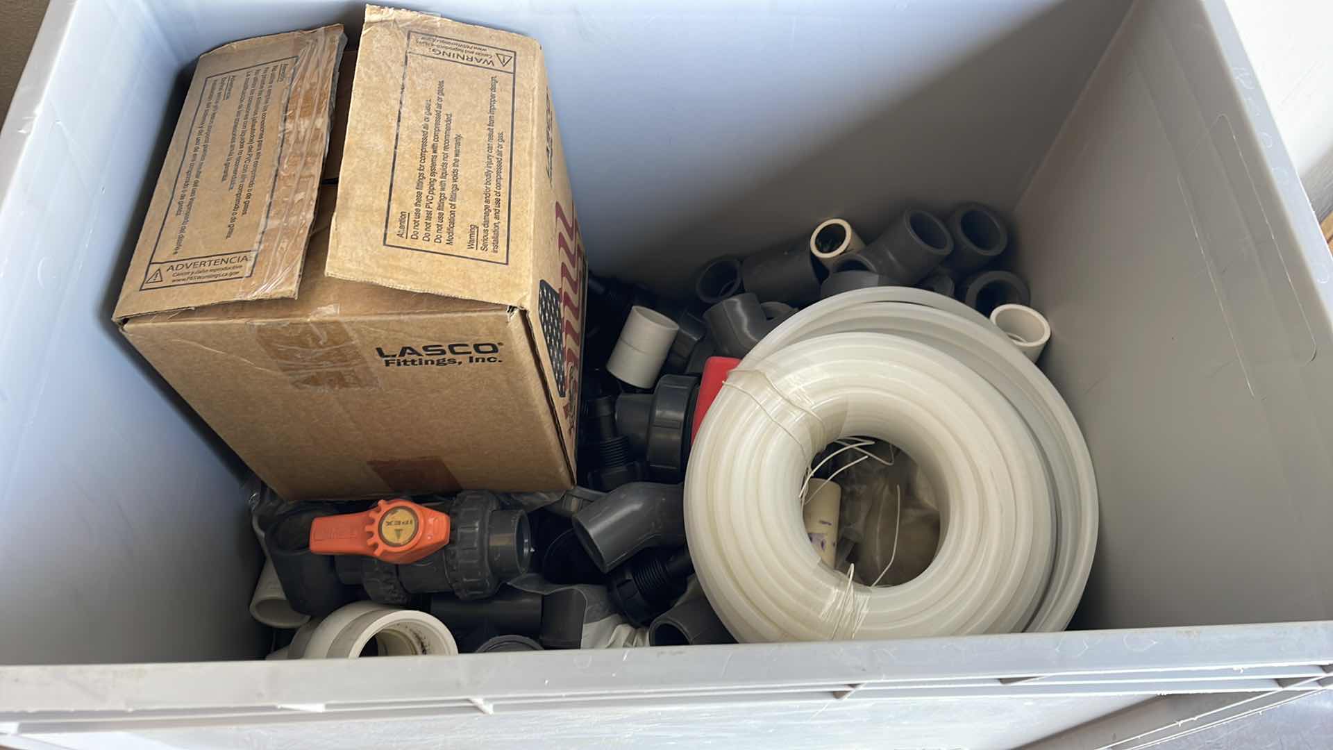Photo 1 of BOXPLUS 24”x16”x17” FULL OF VARIOUS PVC TEES, ELBOWS, JUNCTIONS,  VALVES, TUBING, CAPS