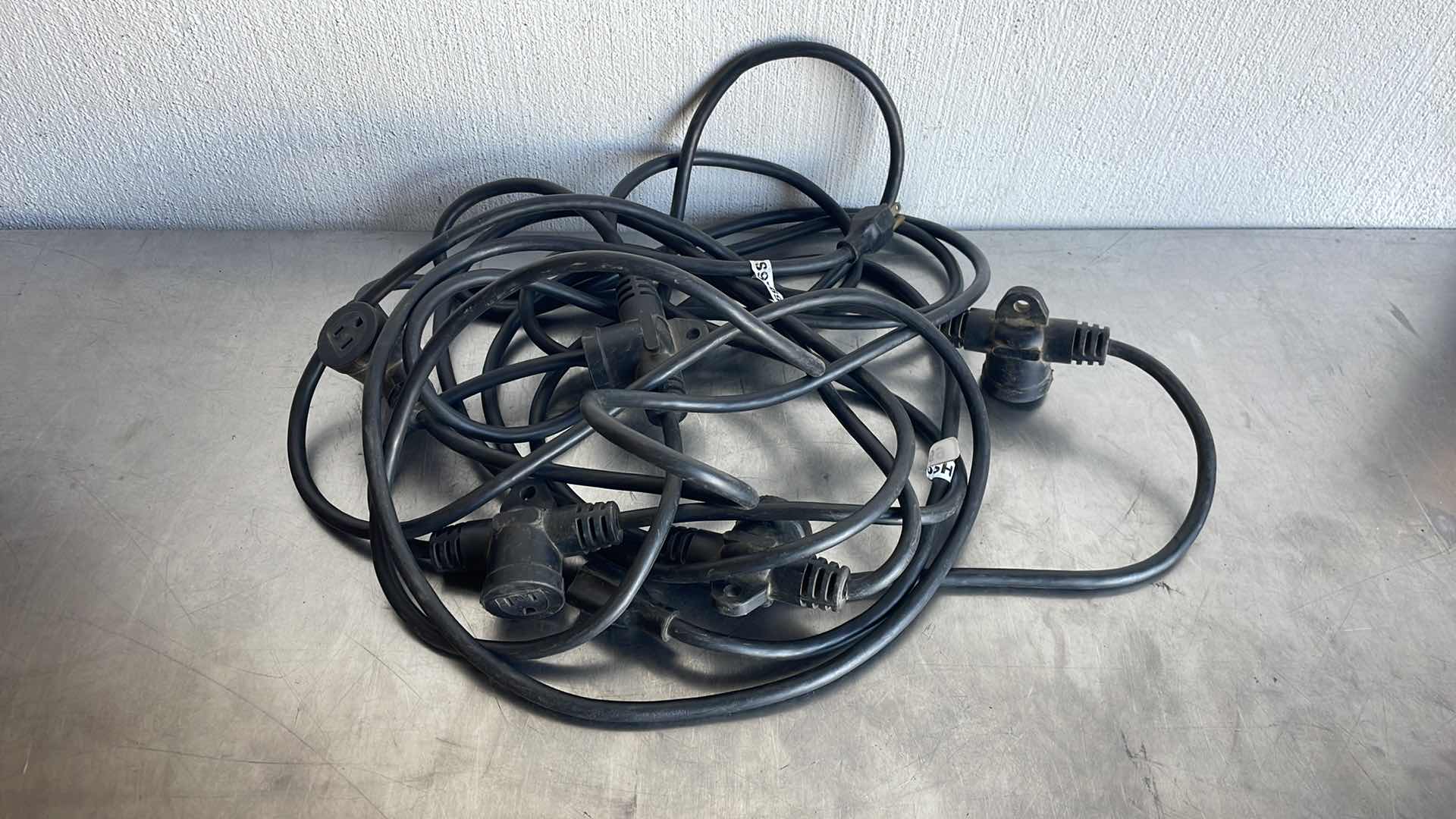 Photo 1 of 50’ ELECTRICAL CORD WITH 5 PLUGS SHOP OR HANGING