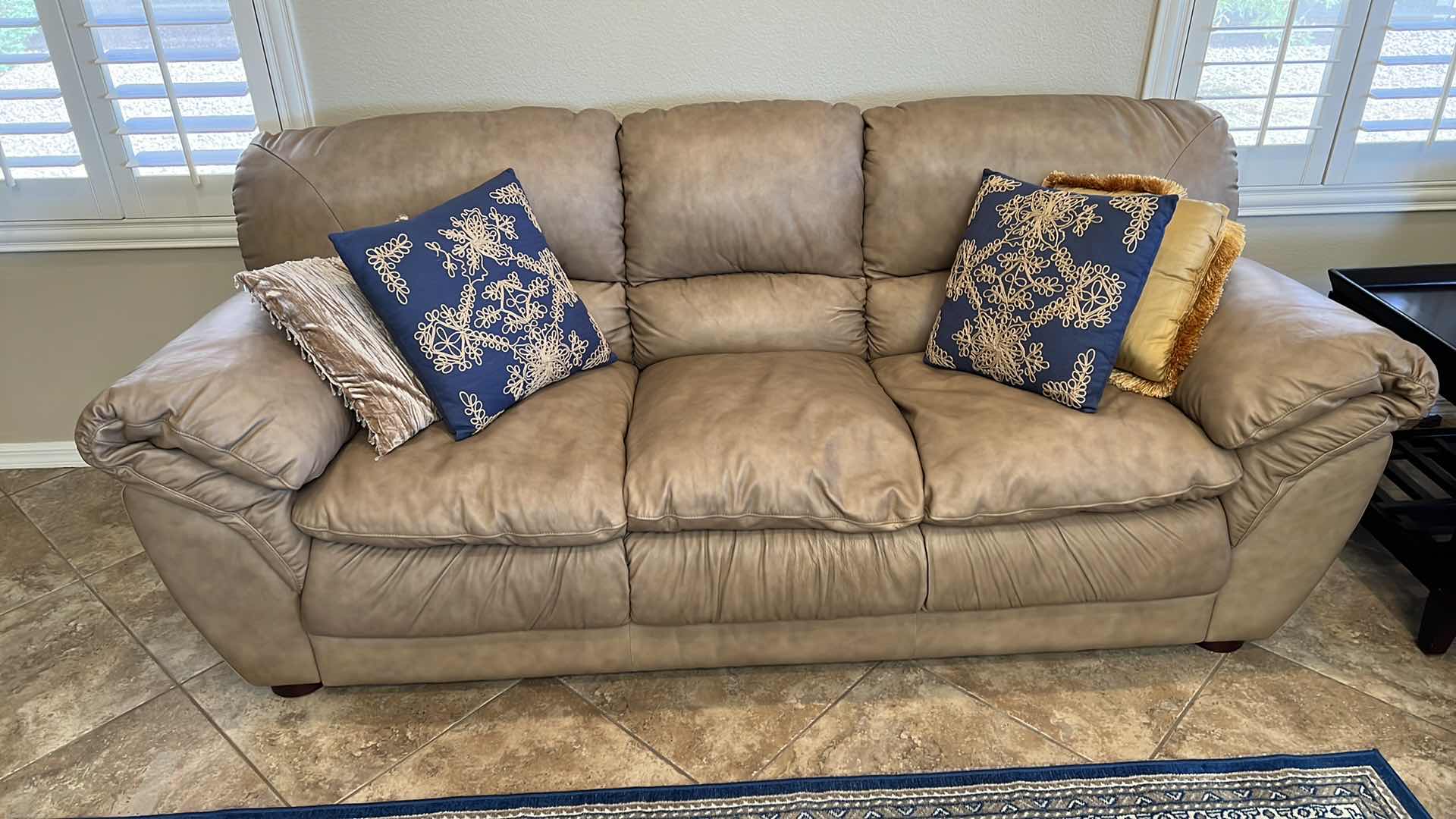 Photo 1 of 7’ TAN LEATHER SOFA W DECORATIVE PILLOWS