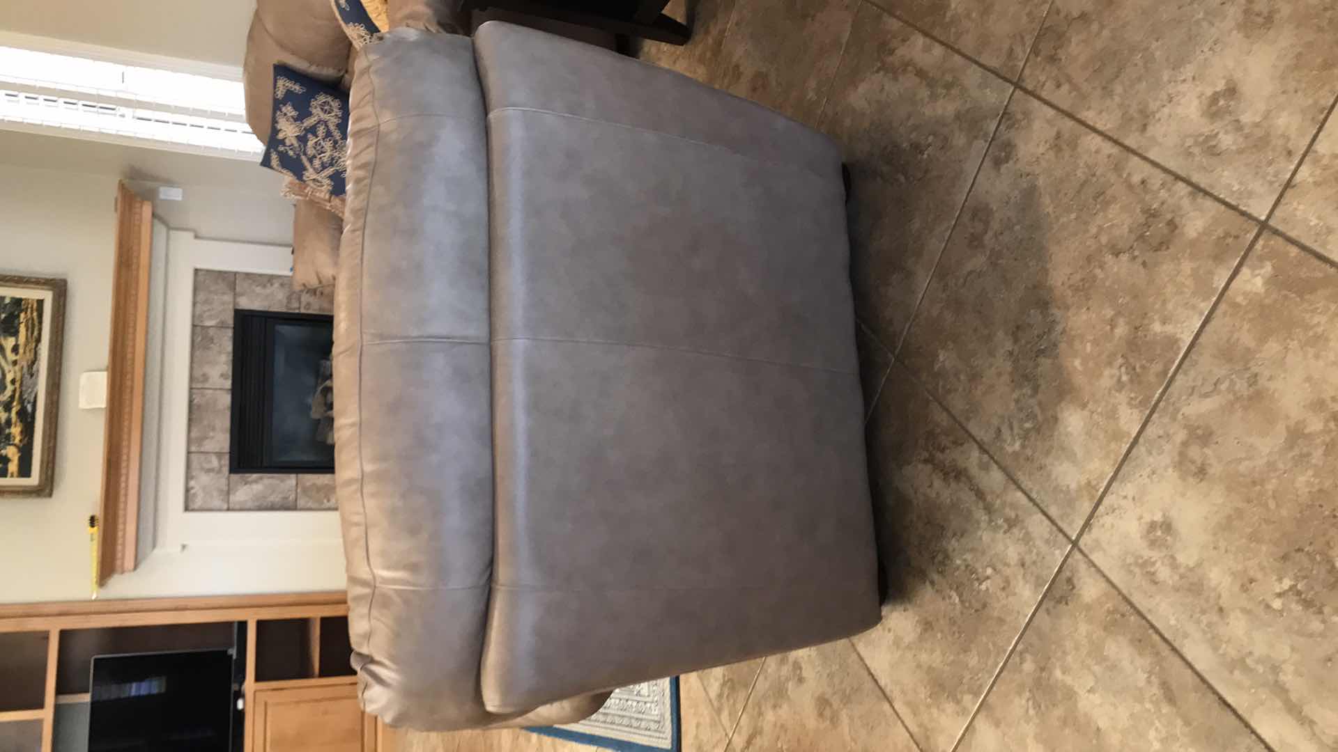 Photo 1 of TAN LEATHER CHAIR AND OTTOMAN