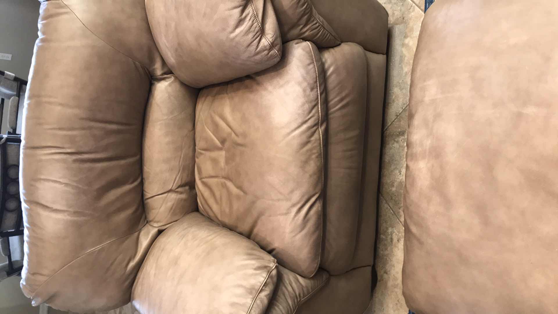 Photo 1 of TAN LEATHER CHAIR AND OTTOMAN